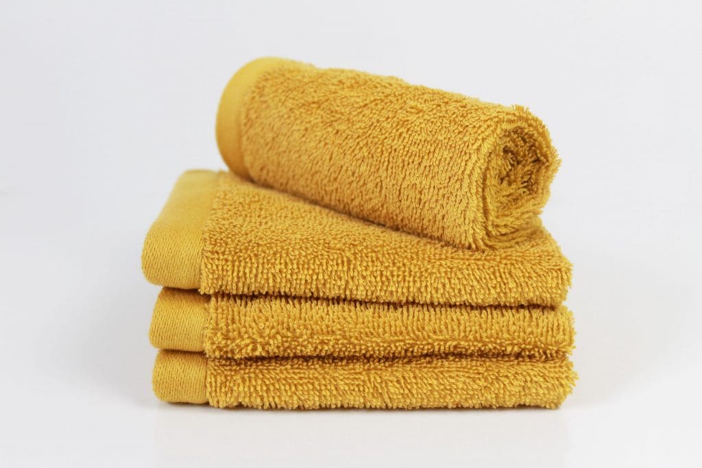 Sustainable living towels in mustard yellow