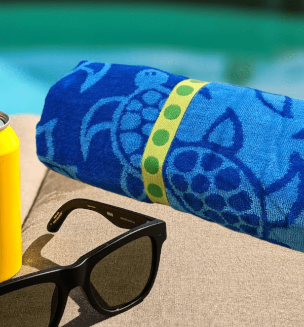 beach towels on sale blue turtle by swimming pool