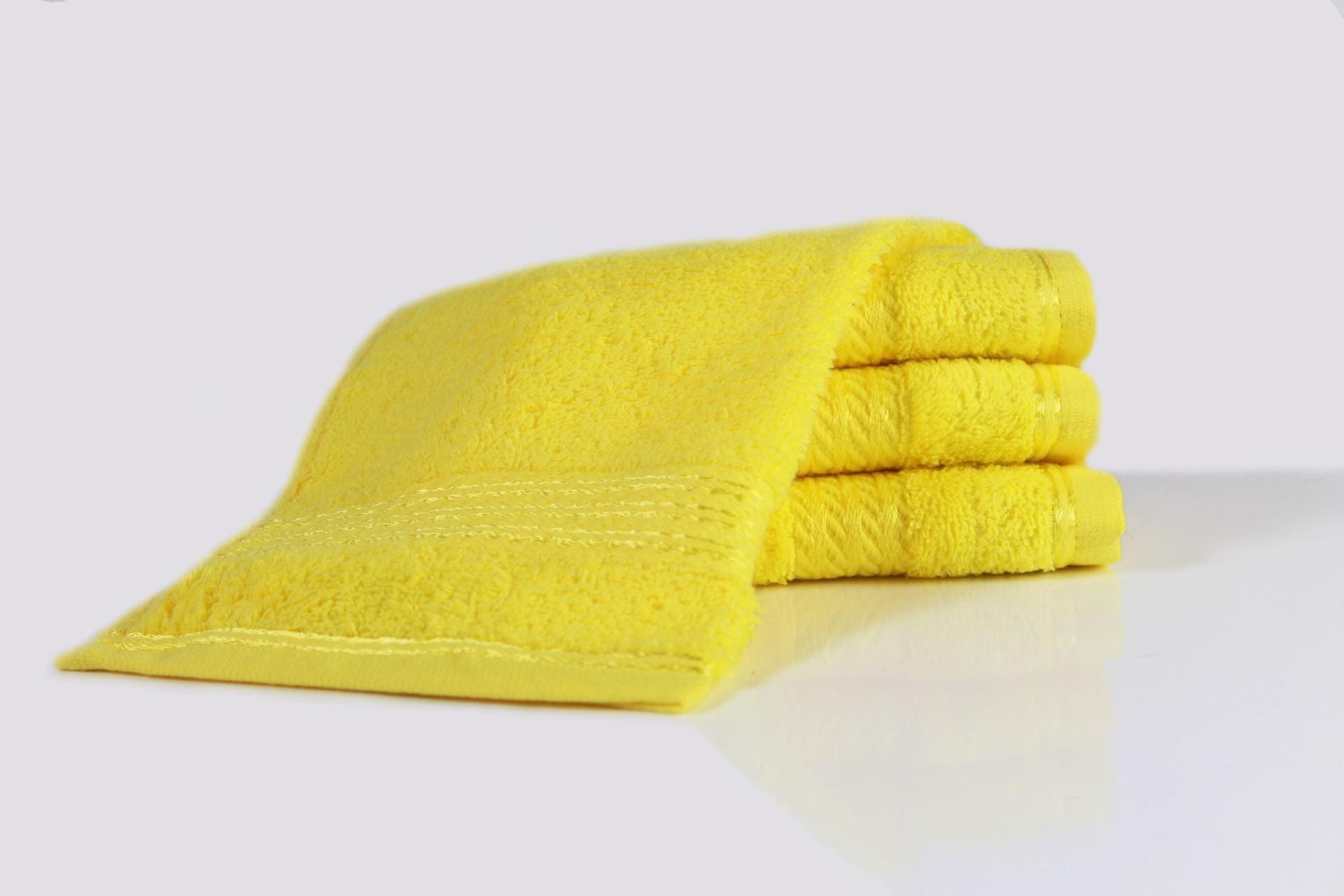 bright yellow guest towels supreme cotton 4 pack 40 x 60 cm