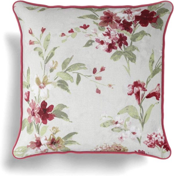 vintage watercolor style red and pink floral cushion cover on a linen background with red piped edging